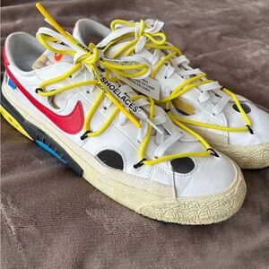 Nike Off-White Sneakers with Yellow and Red Accents